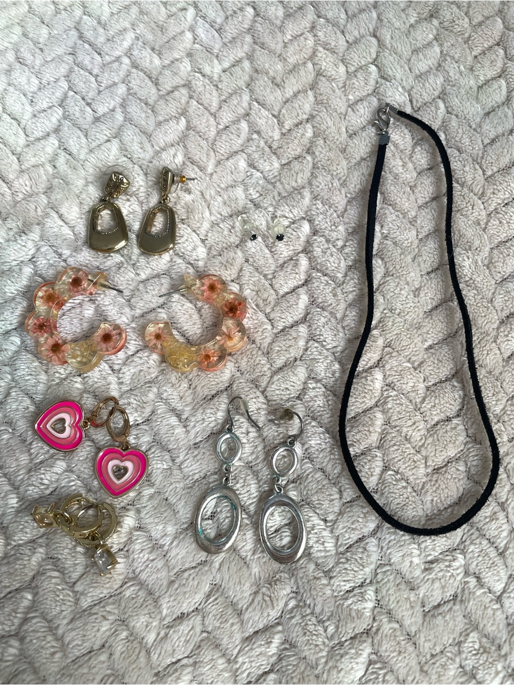Mix of earrings and necklace